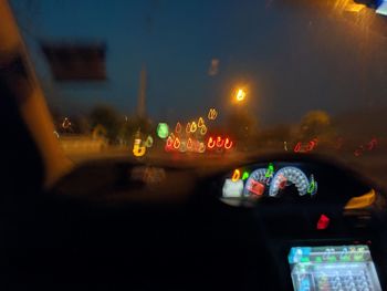 Light painting seen through car window at night