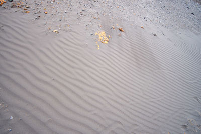 High angle view of rippled water on sand