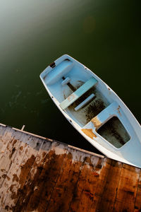 High angle view of boat moored on water