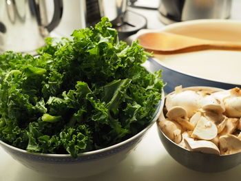 High angle view of chopped vegetables in bowl on table