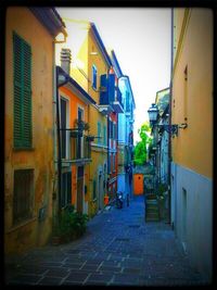 Narrow alley with buildings in background