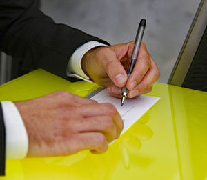 Close-up of man working on table