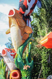 Close-up of statue against plants