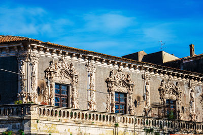 Low angle view of old building against sky