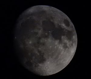 Scenic view of moon against sky at night