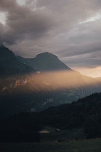 Scenic view of mountains against sky during sunset