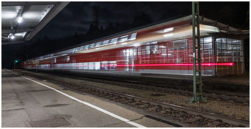 Train at railroad station against sky