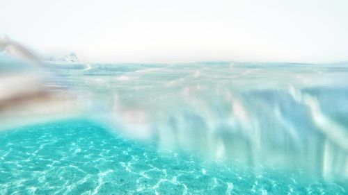 Close-up of swimming pool in sea against sky