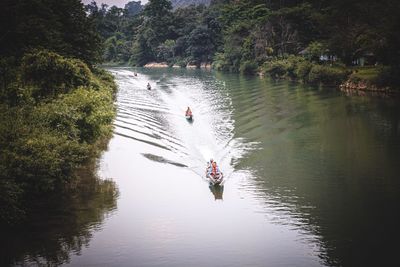 High angle view of people on boat in river