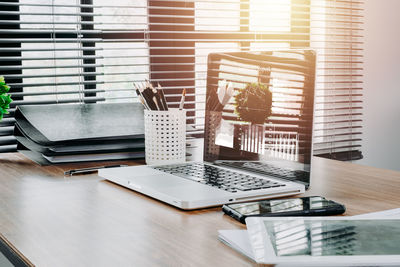 Open book on table at home