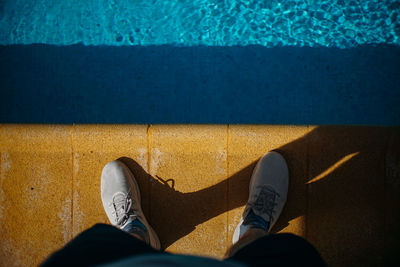 Low section of woman standing on floor