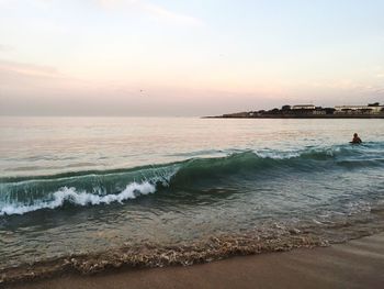 Scenic view of sea at sunset