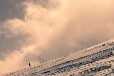 Low angle view of mountain against sky during sunset