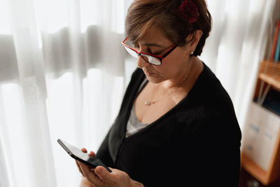 Woman using mobile phone