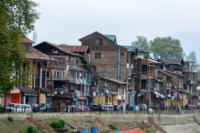 Houses and buildings against sky