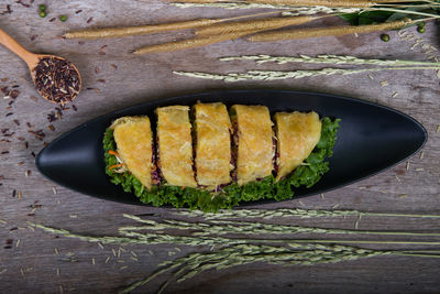 High angle view of fish in plate on table