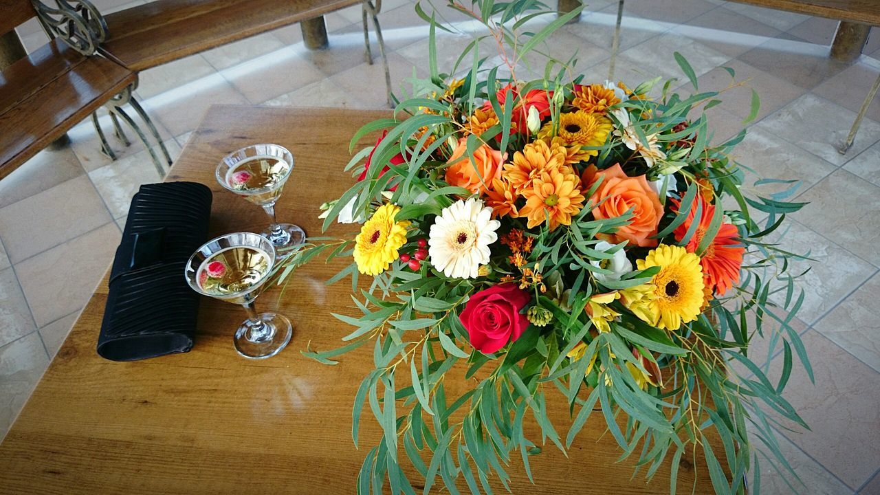 flower, table, high angle view, dining table, plate, variation, bouquet, no people, freshness, outdoors, day