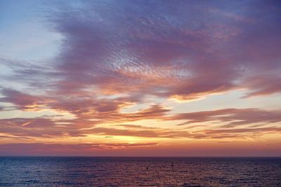 View of calm sea at sunset