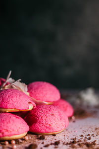 Close-up of pink fruits on table