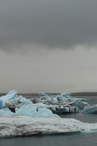 Scenic view of sea against sky during winter