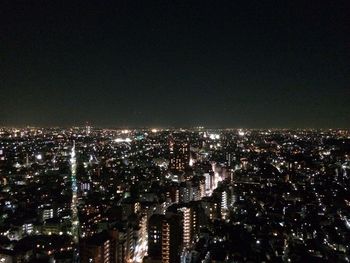 Illuminated cityscape at night