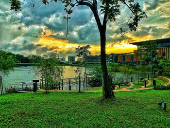 Scenic view of swimming pool against sky at sunset