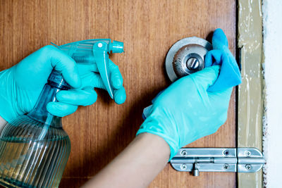 Close-up of man working on wood