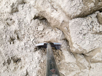 Low angle view of rock on wall