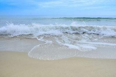 Scenic view of beach against sky