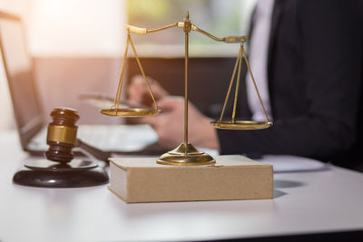 Close-up of electric lamp on table