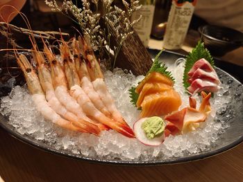 High angle view of fish in plate on table