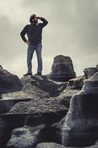 Man standing on rock