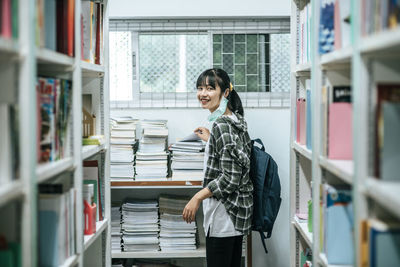 Young woman reading book