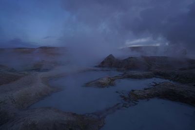 Aerial view of volcanic landscape against sky