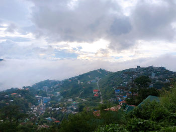 Aerial view of townscape against sky