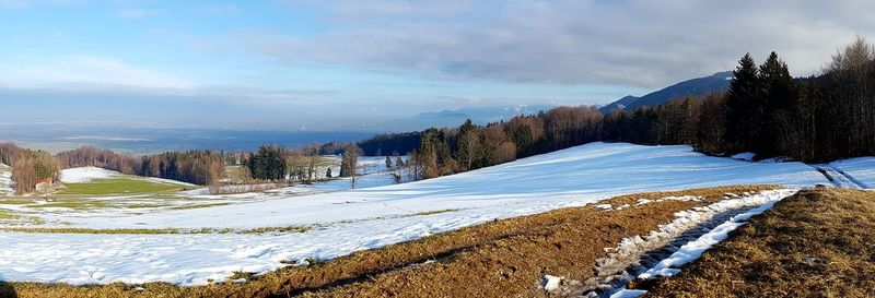 Scenic view of mountains against sky during winter