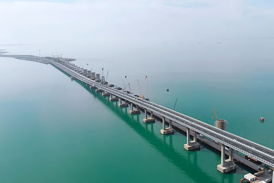 High angle view of bridge over sea against sky