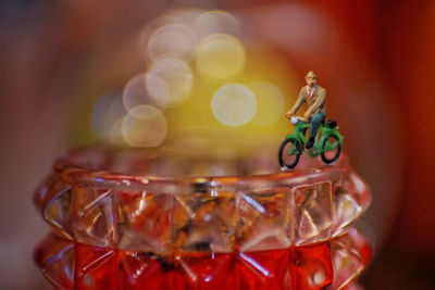 Close-up of red berries on glass table