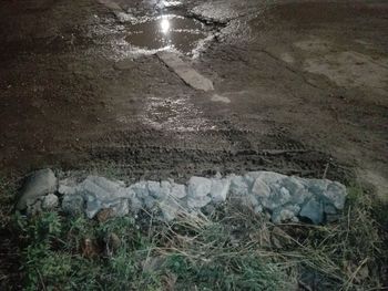 High angle view of rocks on field