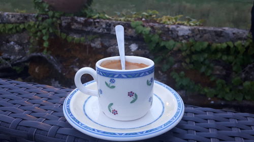 Close-up of coffee cup on table