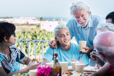 Group of people on table at beach