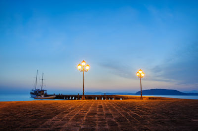 Scenic view of beach against sky during sunset