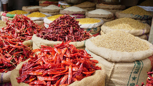 Red chili peppers for sale at market stall