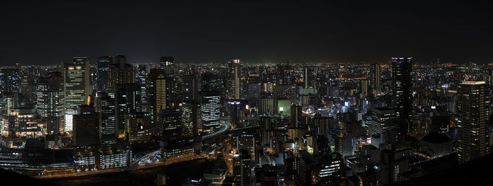 Illuminated cityscape at night