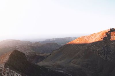 Scenic view of mountains against clear sky