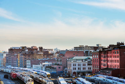 Buildings in city against sky