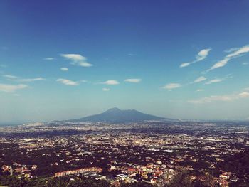 Aerial view of cityscape against sky