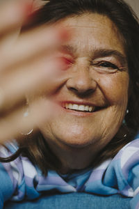 Close-up portrait of a smiling woman