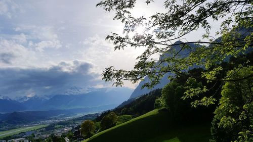 Scenic view of tree mountains against sky