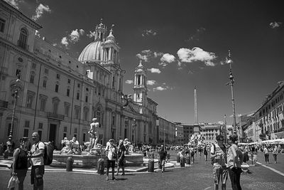 People at piazza navona against sky